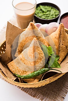 SamosaÂ Snack is an Indian deep fried pastry with a spiced filling usually made with potatoes, spices and herb